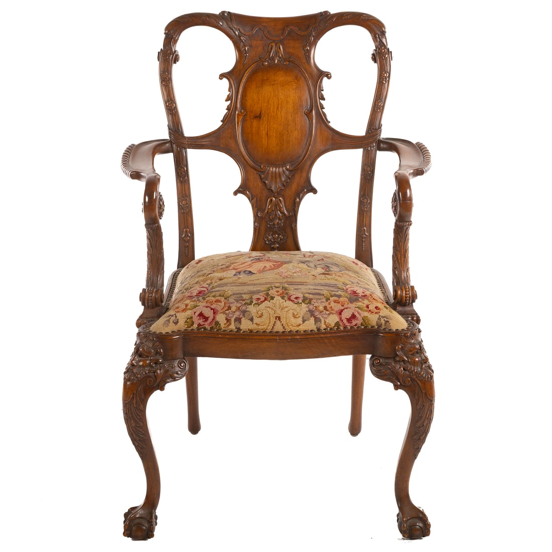 George III Style Carved Mahogany Armchair: Double eagle head carved crestrail with cartouche carved backsplat, gadrooned arms extending to shaped seat, figural knees, ending in webbed foot ball and claw feet, carved throughout, 41 in. H, 28 in