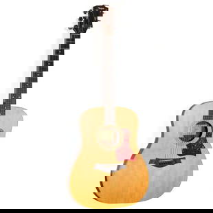 Taylor 210E Acoustic Guitar: Taylor, El Cajon, 1974; natural spruce top, hollow-body, rosewood sides and paneling, with mother of pearl inlaid fret board; serial number 20090206202. InFrom the Estate of Guitarist and Song Writer,
