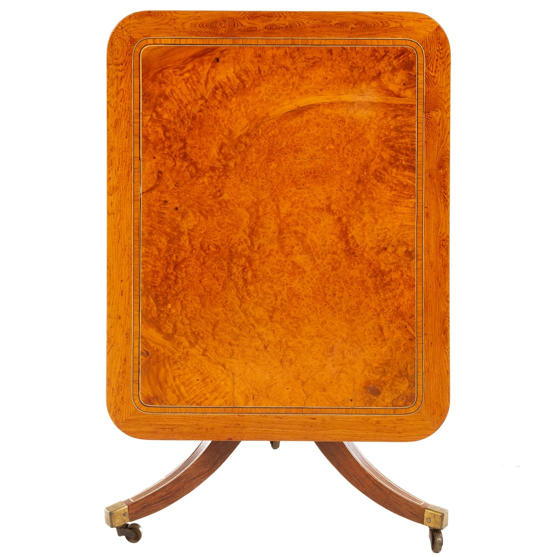 Stair & Co. Burl Walnut Tilt Top Tea Table: Banded burl walnut top on a swiveling pedestal base on tripod sabre legs, Stair & Co. label underneath top, size closed: 21 in. H, 33 1/2 in. W, 27 in. D Provenance: From the Estate of Phyllis Meyerho