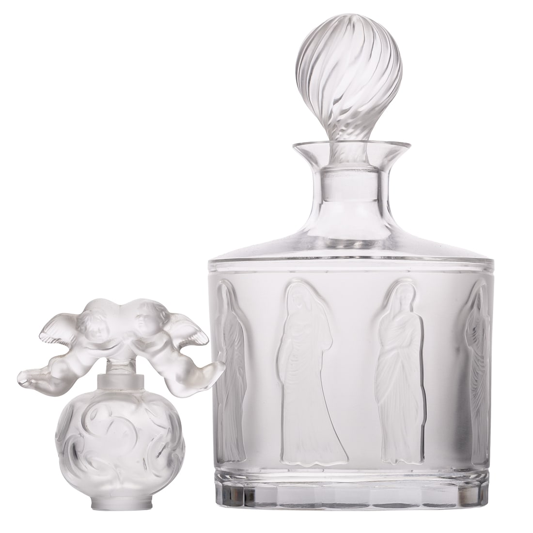 A Lalique "Femme" Decanter & "Falcon Nuages" Perfume Bottle: A colorless and frosted Lalique crystal "Femme" decanter with stopper, with original "Made in France" sticker on bottom, signed " Lalique France" on bottom, depicting robbed female figures, 9 1/2 in. 