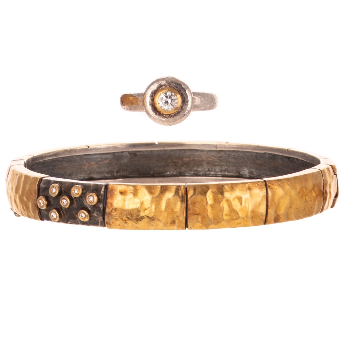 A Gurhan Diamond Ring & Two Toned Diamond Bangle: 1) Sterling silver "Droplet" ring by Gurhan featuring a round diamond weighing approx. 0.35 ct bezel set in vermeil in center, hammered finish, signed, sz 7.25, and 2) Sterling silver and 24K yellow g