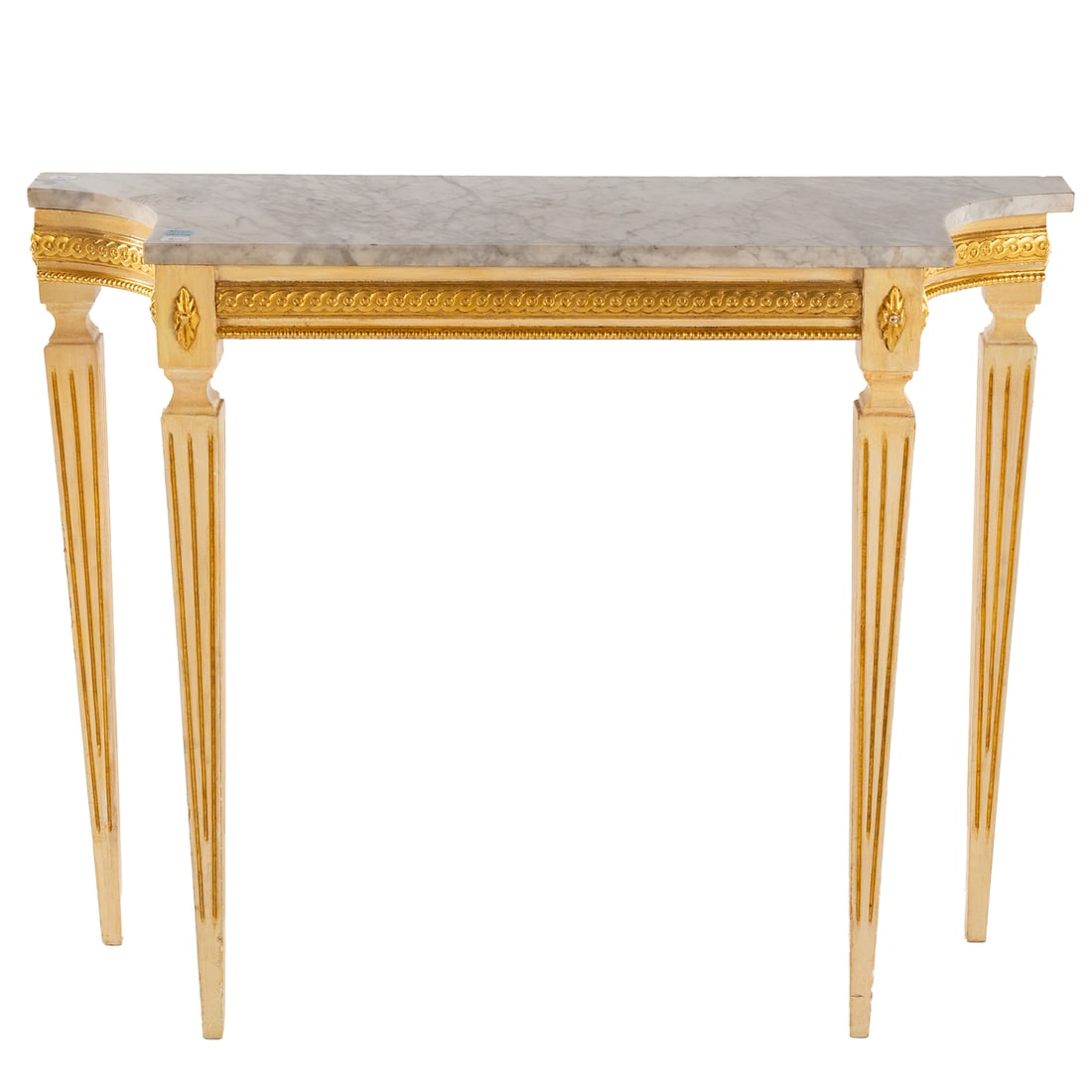 Louis XVI Style Marble Top Console Table: Shaped marble top resting on a carved and gilt apron extending into tapered square reeded legs, 31 1/2 in. H, 39 1/4 in. W, 11 3/4 in. D