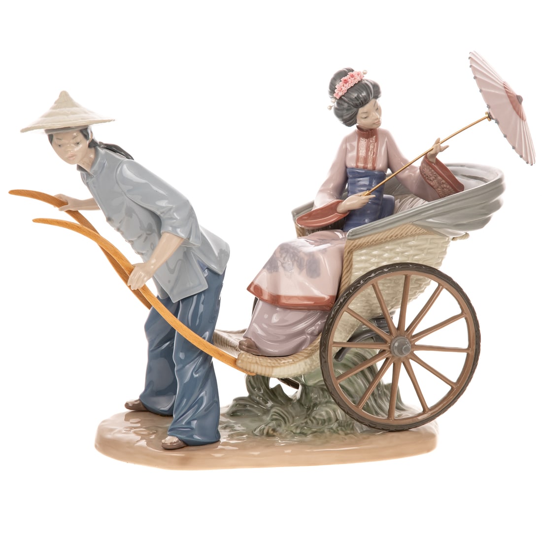 Lladro "A Rickshaw Ride" Porcelain Figural Group: A porcelain "A Rickshaw Ride" Lladro figure by Salvador Debon depicting a woman holding a parasol in a rickshaw getting pulled by a man, marked on bottom, #1383, 11 1/2 in. H, approx. 15 1/2 in. W, ap