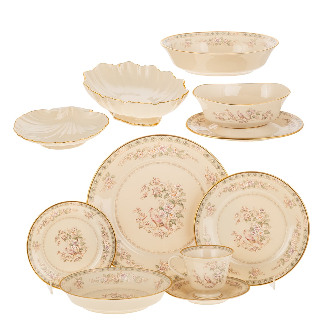 A Lenox Fair Isle Pattern China Dinner Service: A Lenox Fair Isle pattern dinner service; game and floral decorated with gilt trim, includes: 14 dinner plates, 13 cups and saucers, 13 bowls, gravy boat with attached underplate, open vegetable servi