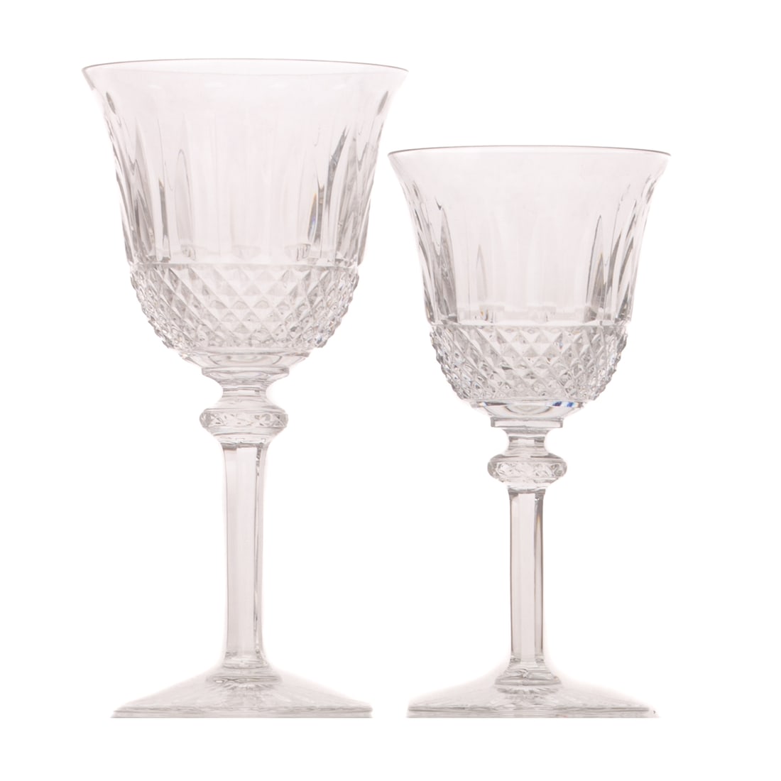Eight Saint Louis Crystal "Tommy" Stemware Glasses: (French) A set of colorless Saint Louis crystal Tommy pattern stemware, all discontinued. Includes four colorless burgundy wine #3 glasses, 6 3/4 in. H, 3 1/4 in. Diam.; and four colorless water goble