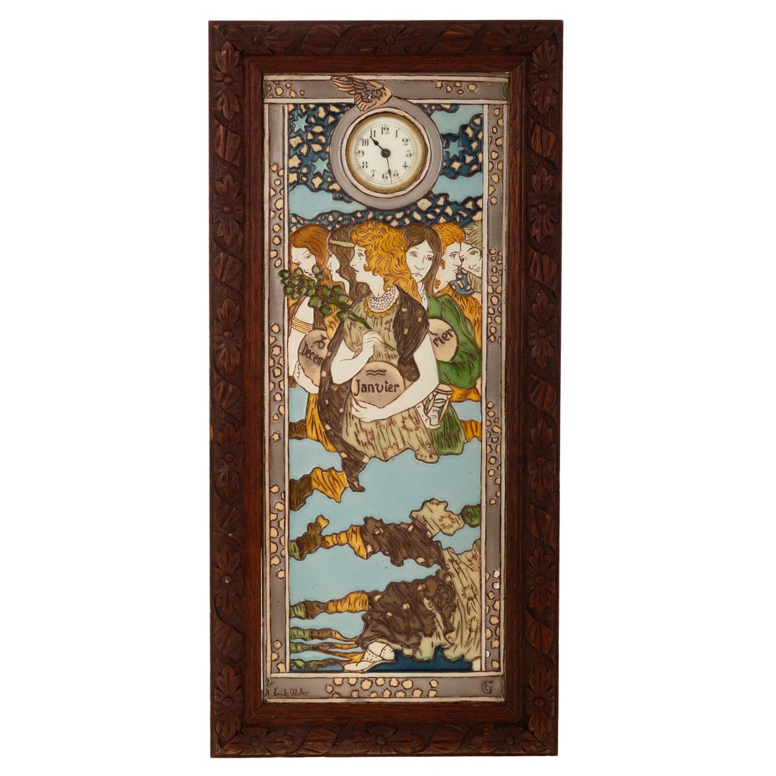 An Art Nouveau Ceramic Tile Calendar/Clock by Eugene Grasset for Emile Muller: An Art Nouveau ceramic tile clock by Eugene Grasset for Emile Muller in a floral carved oak frame, signed EG at lower right for Eugene Grasset and Emile Muller in script at lower left. Incised stamp m