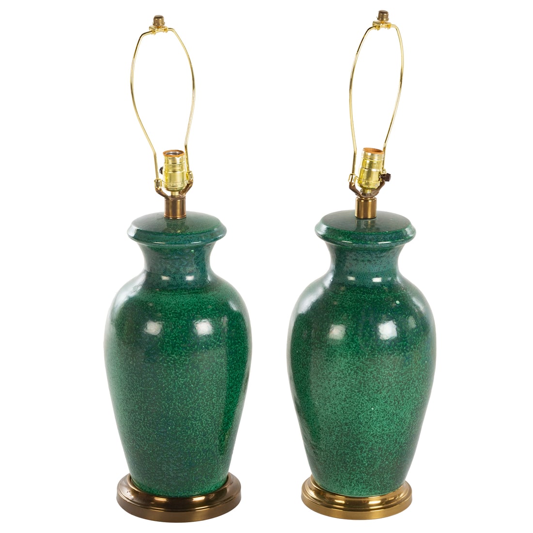 A Pair of Art Pottery Lamps Attributed to Christopher Spitzmiller: A pair of green art pottery lamps attributed to Christopher Spitzmiller, includes black shades, 20 3/4 in. H, 28 1/2 in. H including the harp, approx. 8 1/2 in. Diam.