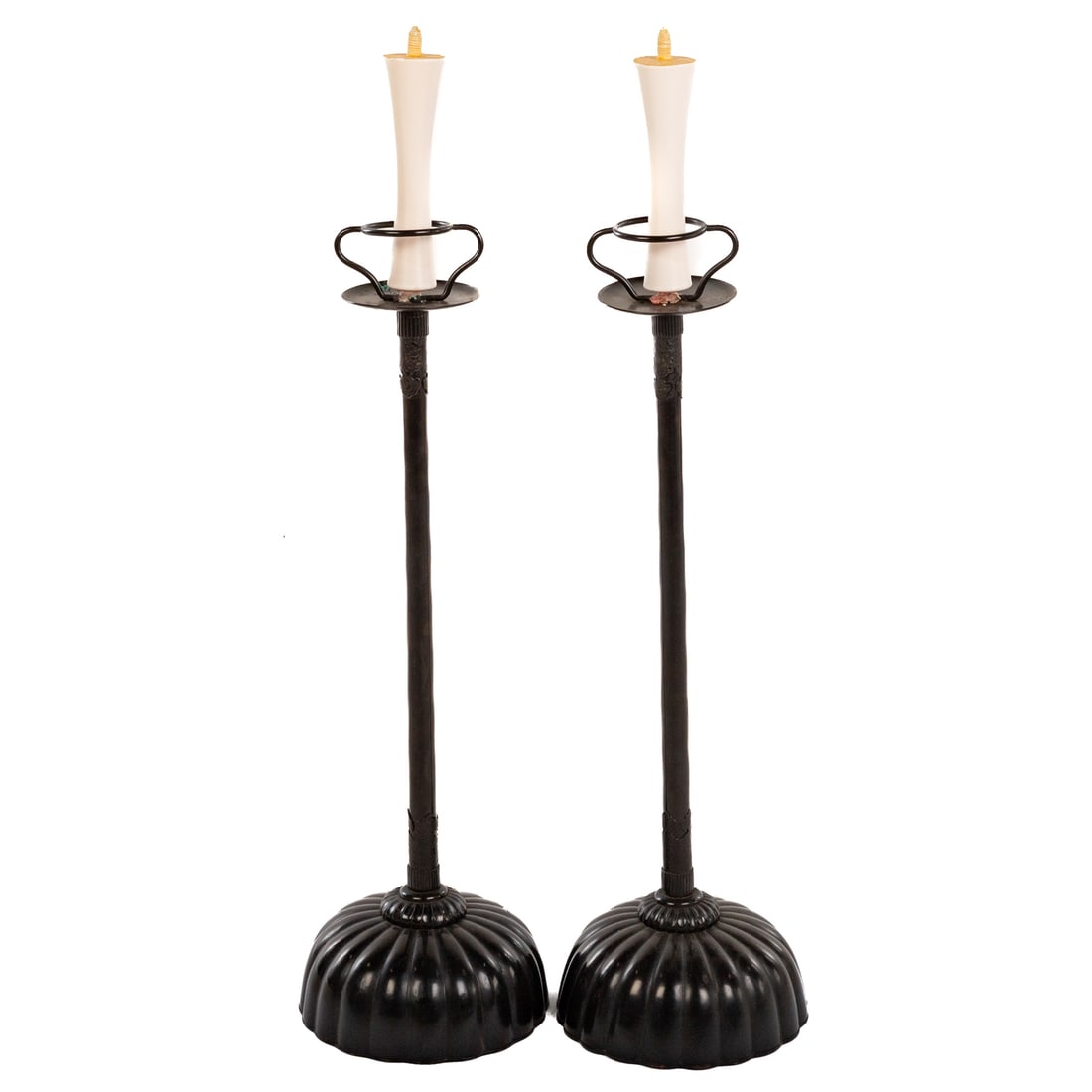 A Pair of Japanese Style Pricket Sticks: Early 20th century, a pair of black copper alloy Japanese style pricket sticks with weighted reed form bases, includes candlesticks, approx. 28 3/4 in. H, 9 1/2 in. Diam.