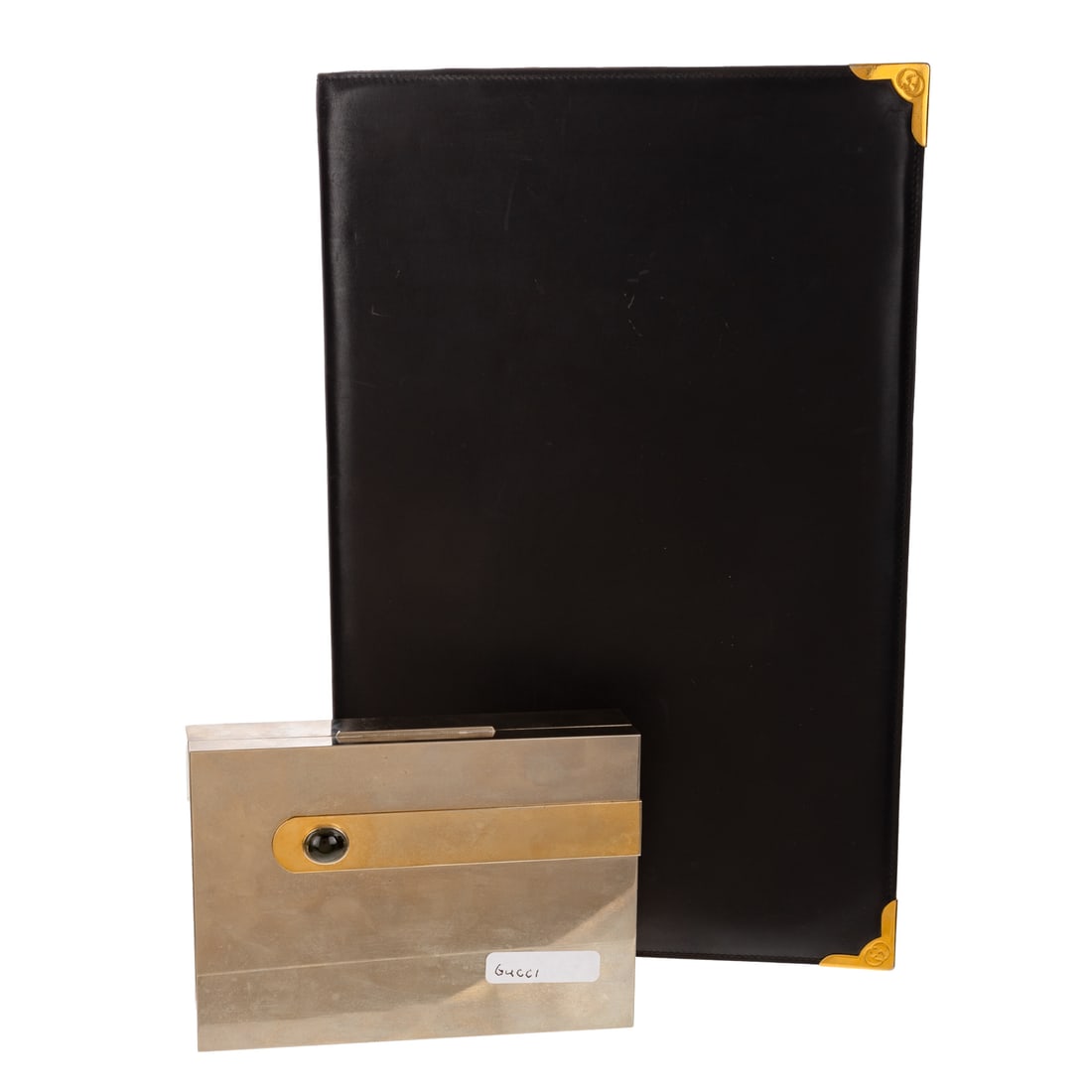 A Vintage Gucci Box & a Vintage Gucci Portfolio: A vintage silver plated Gucci box, partially lacquered interior silver and gold tone exterior with dark green stone accent, and Gucci plaque in interior, 1 1/2 in. H, approx. 6 3/4 in. L, approx. 5 in