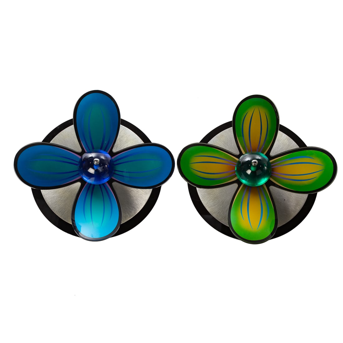 A Pair of Haziza Acrylic Wall Flowers: A pair of polished metal and colored lucite wall flowers, both signed on petal, approx. 5 1/2 in. D, approx. 18 in. Diam.