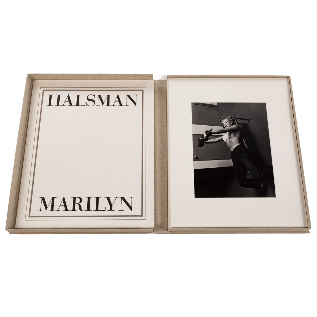 Philippe Halsman. "Marilyn," photographs: Comprising a large quilt folio, containing a rare collection of original matted silver gelatin prints of Marilyn Monroe; with a print introduction and notes by Halsman; each image size: 8 x 14 in. Pro