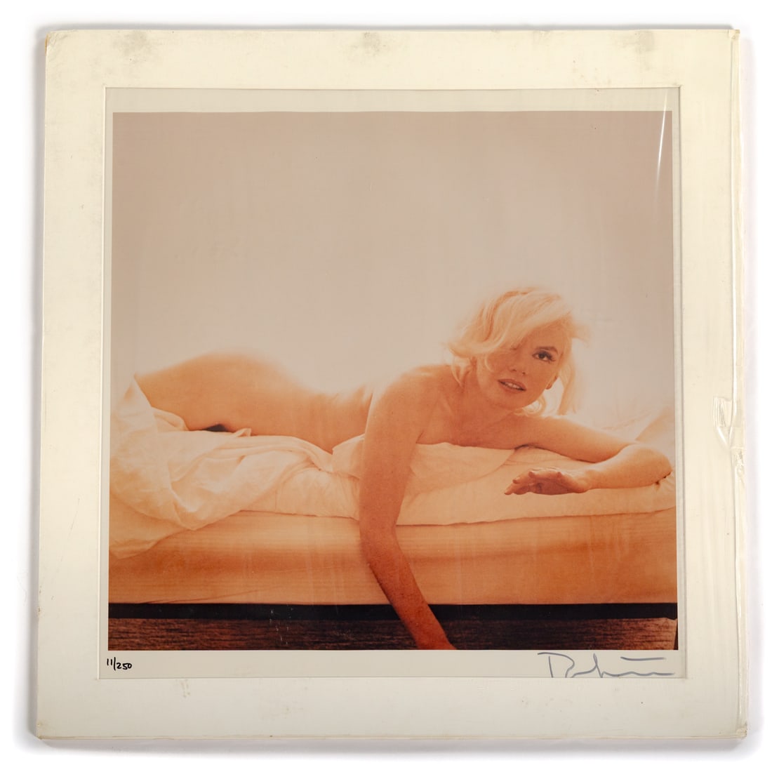 Bert Stern. "Playful," photograph: An original color photograph of Marilyn Monroe from Bert Stern's "The Last Sitting" photo series, signed lr, mat size: 24 3/4 x 23 1/2 in., image size: 18 3/4 x 18 3/4 in. Provenance: From the Estate