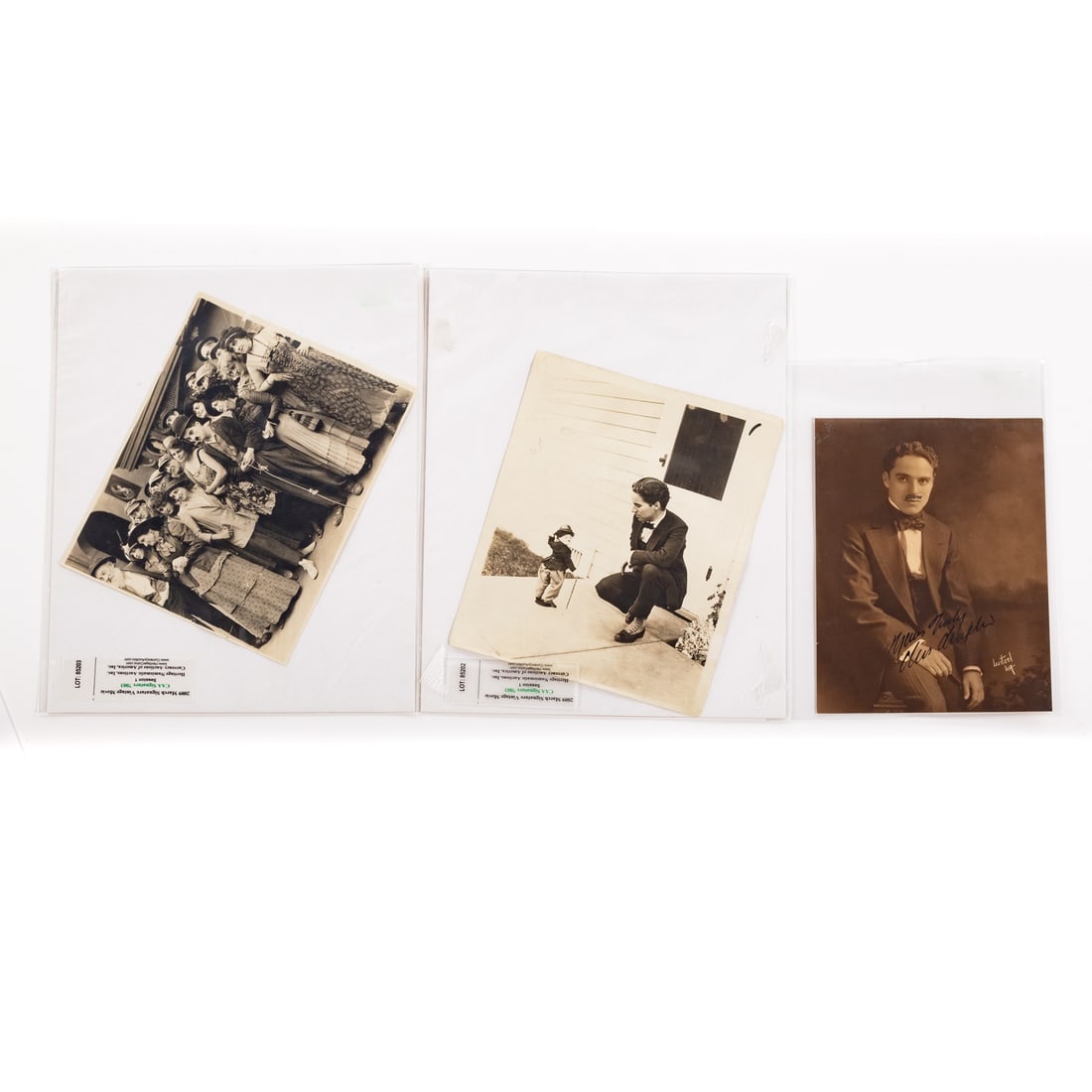 Charlie Chaplin, Autographed Photo: Comprising an antique photo of young Chaplin, with autograph reading "Yours Truly/Chas Chaplin," where he has also added an ink mustache to the photo, sight size: 9 1/4 x 7 in.; together with an 8 x 1