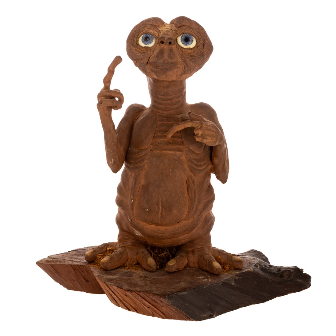 An Original Clay Maquette Figure of E.T. the Extra-Terrestrial: An original clay maquette figure of E.T. for "E.T.: The Extra-Terrestrial" (dir. Steven Spielberg, 1982), 16 in. H, 15 in. L, approx. 11. D. Kiln fired by E.T. effects operator Carlo Rambaldi, fixed u