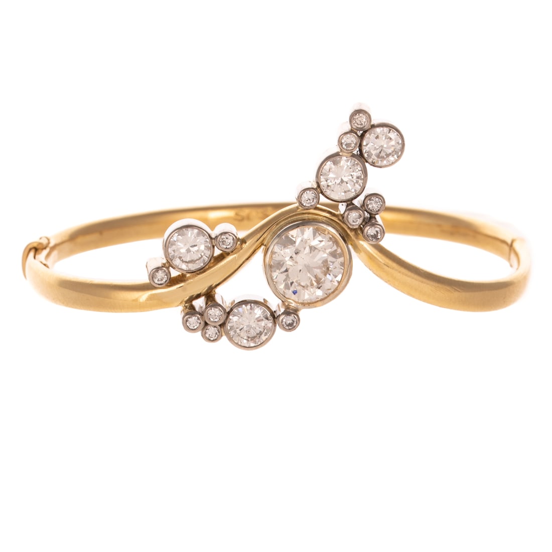 A 4.00 ctw Diamond Bangle in 18K: 18K yellow gold hinged bangle featuring a bezel set Old European cut diamond weighing approx. 2.50 carats with an average color grade of J - K and an average clarity grade of SI surrounded by an organ
