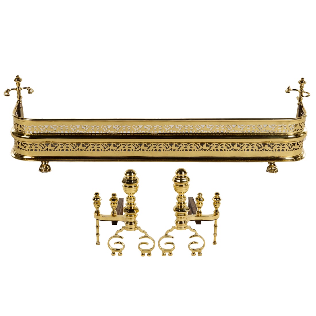 A Pair of Brass Andirons & Fender: A pair of brass andirons, 19 in. H, 15 in. W, 26 in. D; and a reticulated fireplace fender, with integral tool stands, 13 1/2 in. H, 47 1/2 in. W, 11 in. D