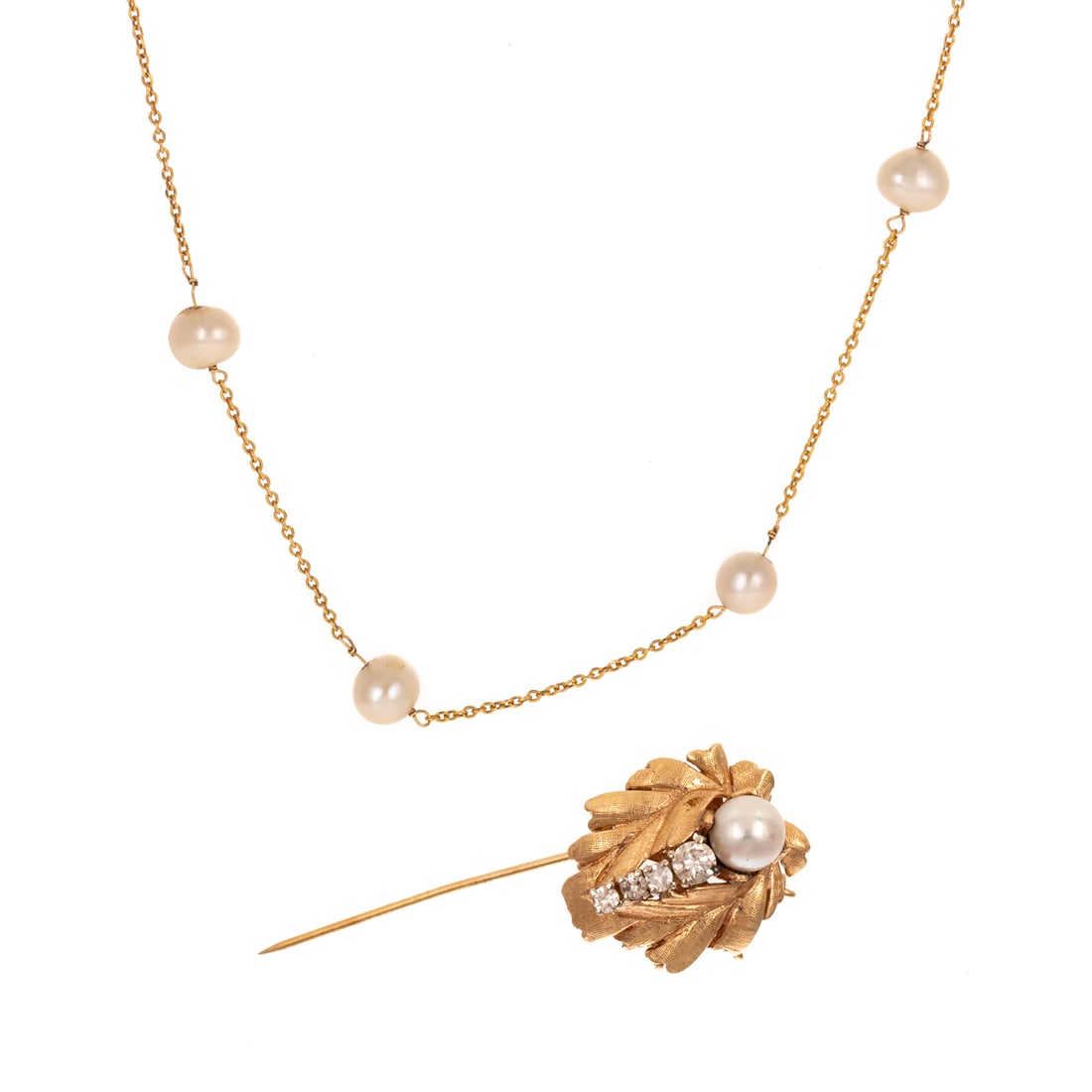 A Tin Cup Pearl Necklace & Stick Pin in 14K: 1) 14K yellow gold tin cup pearl necklace featuring 11 slightly baroque pearls evenly spaced between cable link chain, spring ring clasp, 18.25 in. L, and 2) 14K yellow gold stick pin featuring a 6.5