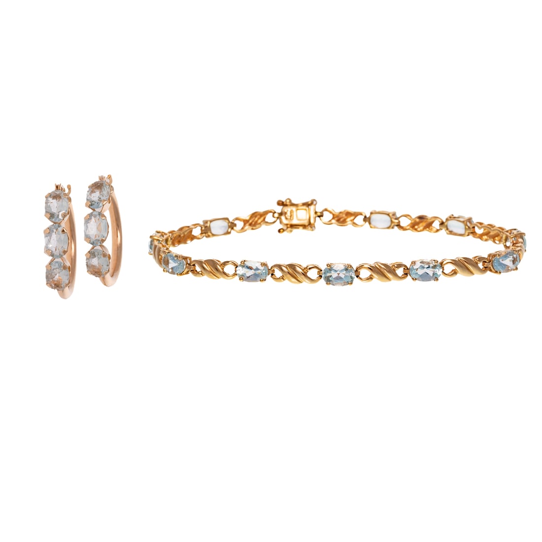 An Aquamarine Bracelet & Earrings in 10K: 1) 10K yellow gold bracelet featuring oval faceted aquamarines measuring 4 x 6 mm prong set in between high polish infinity links, hidden box clasp and double safety latches, 7 in. L, and 2) 10K yello