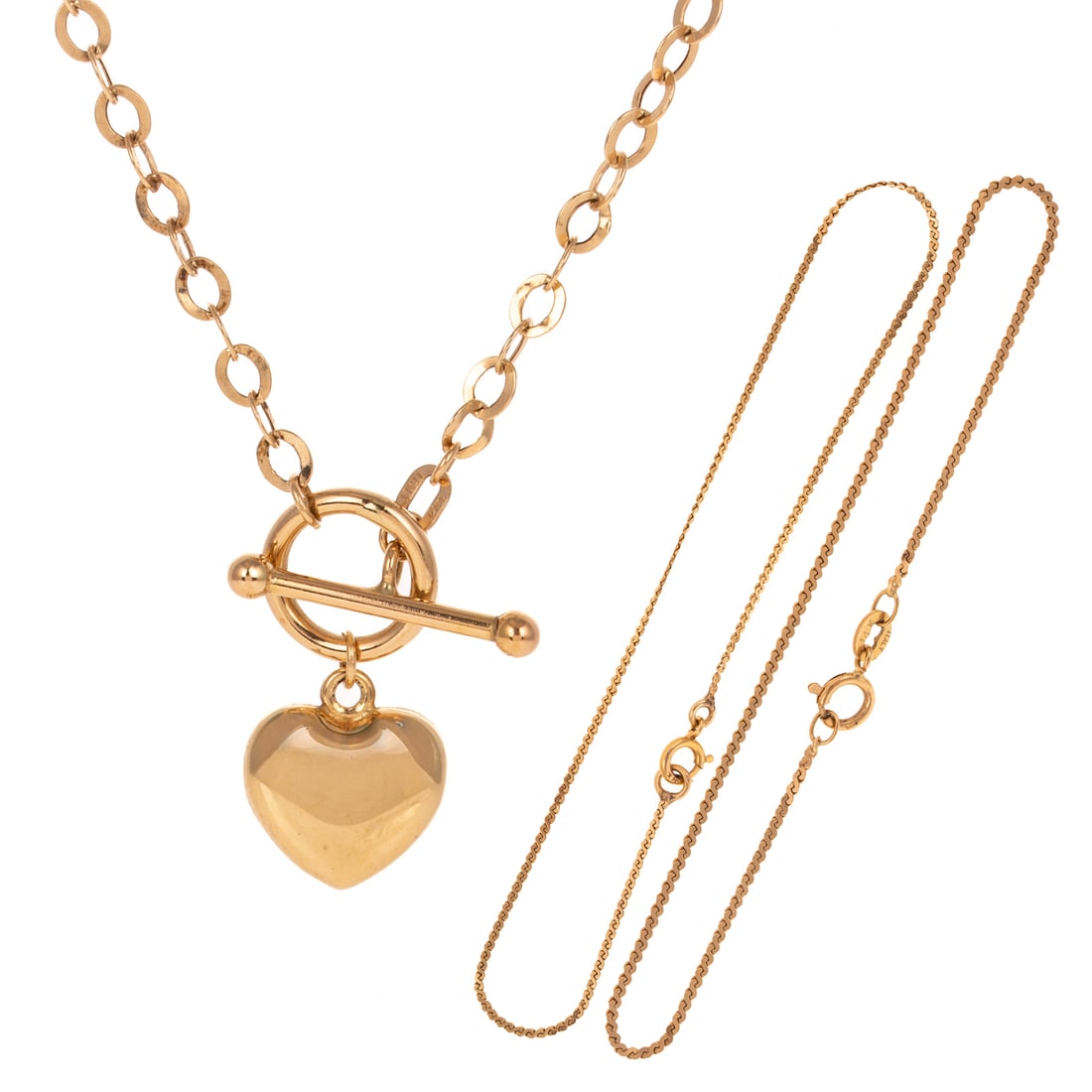 A Heart Toggle Necklace & Two Bracelets in 14K: 1) 14K yellow gold Italian necklace featuring a curb link chain terminating in a high polish heart, toggle closure, 15 1/2 in. L, and 2) 14K yellow gold pair of serpentine chain link bracelets,