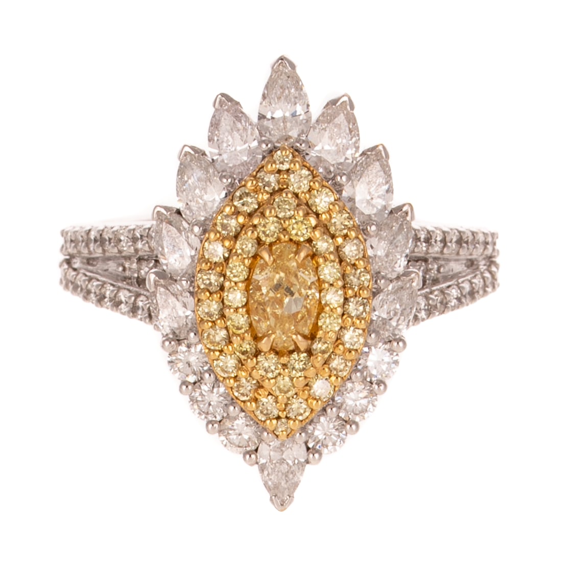 A Convertible Marquise Halo Diamond Ring/Pendant in 18K: 18K white gold convertible ring/pendant featuring a prong set oval yellow diamond weighing approx. 0.30 ct surrounded by two yellow diamond halos with an outer most halo of white diamonds, additional