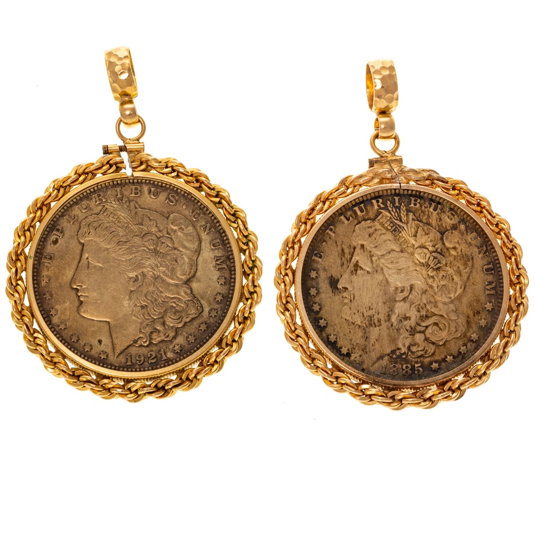 Two Large Silver Coins in 14K Bezels: 1) 14K yellow gold rope chain bezel featuring 1921 Morgan silver dollar, 1 7/8 in. W, and 2) 14K yellow gold rope chain bezel featuring a 1885 Morgan silver dollar, 1 7/8 in. W, 70.6 grams tw Provenan