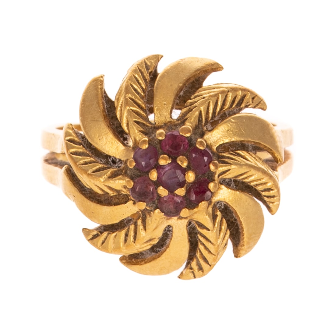 A Domed Spiral Ruby Ring in 18K: 18K yellow gold domed ring with alternating texture spiral design with cluster of rubies in center, split shank, signed HOR, sz 5, 7.4 grams Provenance: From the Estate of Dr. Vira Froehlinger, Towson