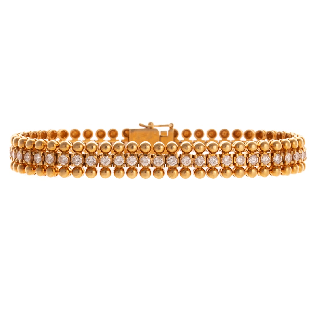 A 3.58 ctw Diamond Bead Bracelet in 18K: 18K yellow gold line bracelet featuring well matched round diamonds weighing approx. 3.58 ctw with an average color grade of F - G and an average clarity grade of VS, set down the center of high