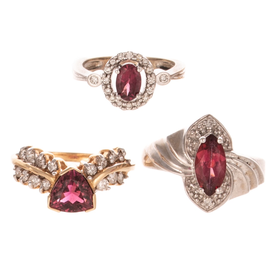 A Trio of Tourmaline & Garnet Rings in 14K: 1) 14K white gold ring featuring an oval pink tourmaline surrounded by a halo of diamonds, sz 4, 2) 14K yellow gold ring featuring trillion pink tourmaline with double row of prong set diamonds weighi