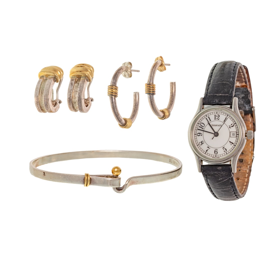 A Tiffany & Co. Wristwatch, Silver & 18K Jewelry: 1) Stainless steel Classic wristwatch by Tiffany & Co., round white dial with Arabic numerals and date window at 3 o'clock, 26 mm, quartz movement, black leather strap, signed, 2) Sterling silver and