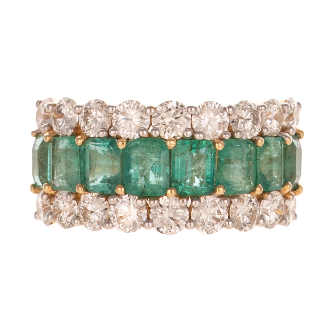 An Emerald & Diamond Half Eternity Band in 14K: 14K yellow gold ring by Oscar Friedman featuring a row of emerald cut emeralds weighing approx. 3.89 ctw prong set between two rows of prong set round diamonds weighing approx. 2.71 ctw with an averag