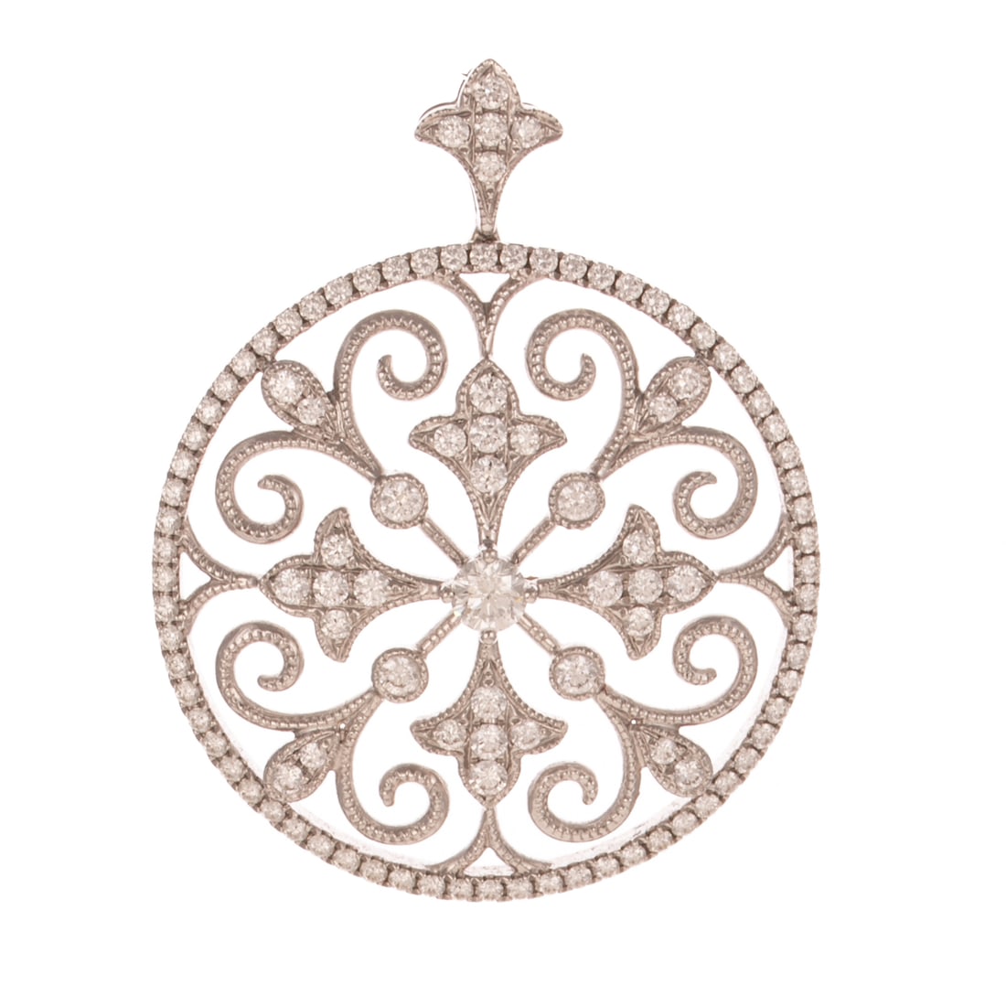 A Diamond Filigree Pendant in 18K: 18K white gold scroll circular pendant featuring bead set diamonds weighing approx. 1.20 ctw with an average color grade of F - G and an average clarity grade of VS, 1.5 in. L, 1.25 in. W, 6.5 grams