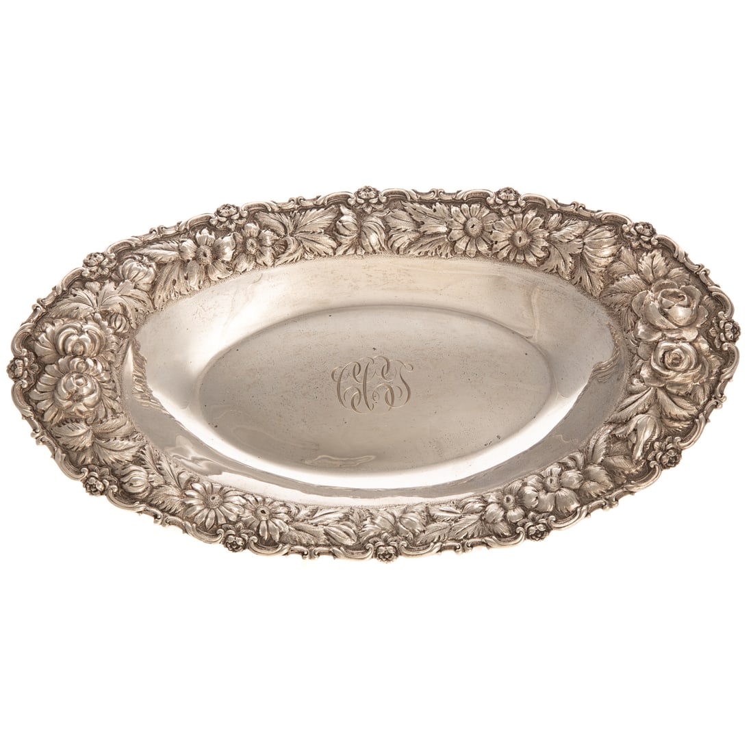 Stieff Sterling Repousse "Rose" Bread Tray: 1948 date mark, model# 202, oval, with repousse border of roses and other flowers and foliage, against a stippled ground, applied scroll and floral rim, centered with a monogram, 13 1/4 in. W, 7 1/2