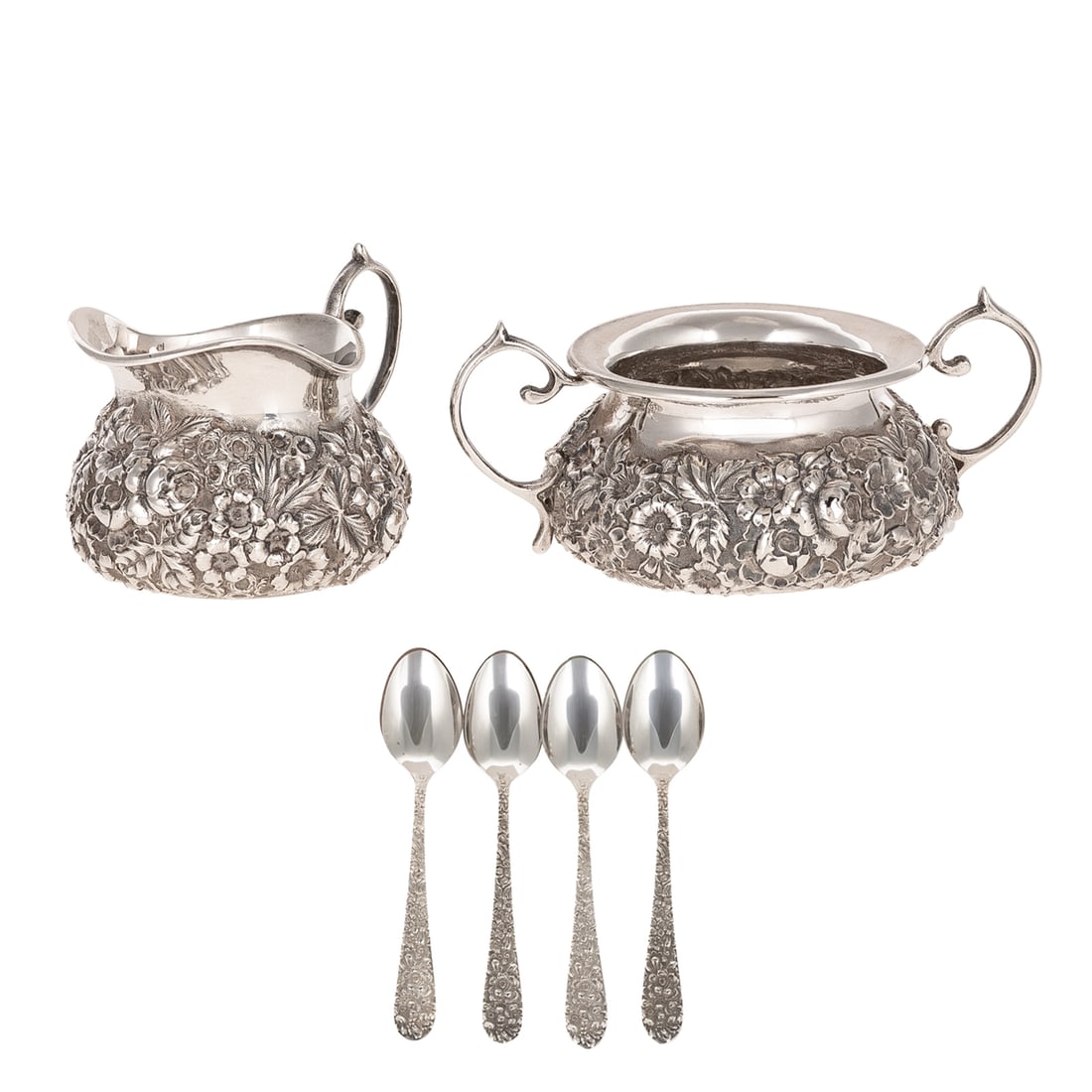 Collection of Baltimore Sterling Tableware: Including: James R Armiger Co. creamer and sugar, 1892-1936, model# 2, with repousse floral and foliate decoration allover, 2 in. to 2 1/4 in. H, 5.05 ozt.; and eight Stieff "Rose" demitasse spoons,