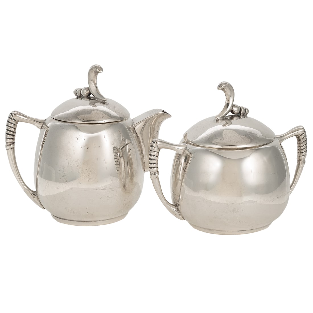 Mexican Modernist Sterling Creamer & Sugar: By C. Zurita, mid-20th century, creamer is 3 1/2 in. to 5 in. H overall, sugar is 3 in. to 4 1/2 in. H overall, 24.4 ozt.