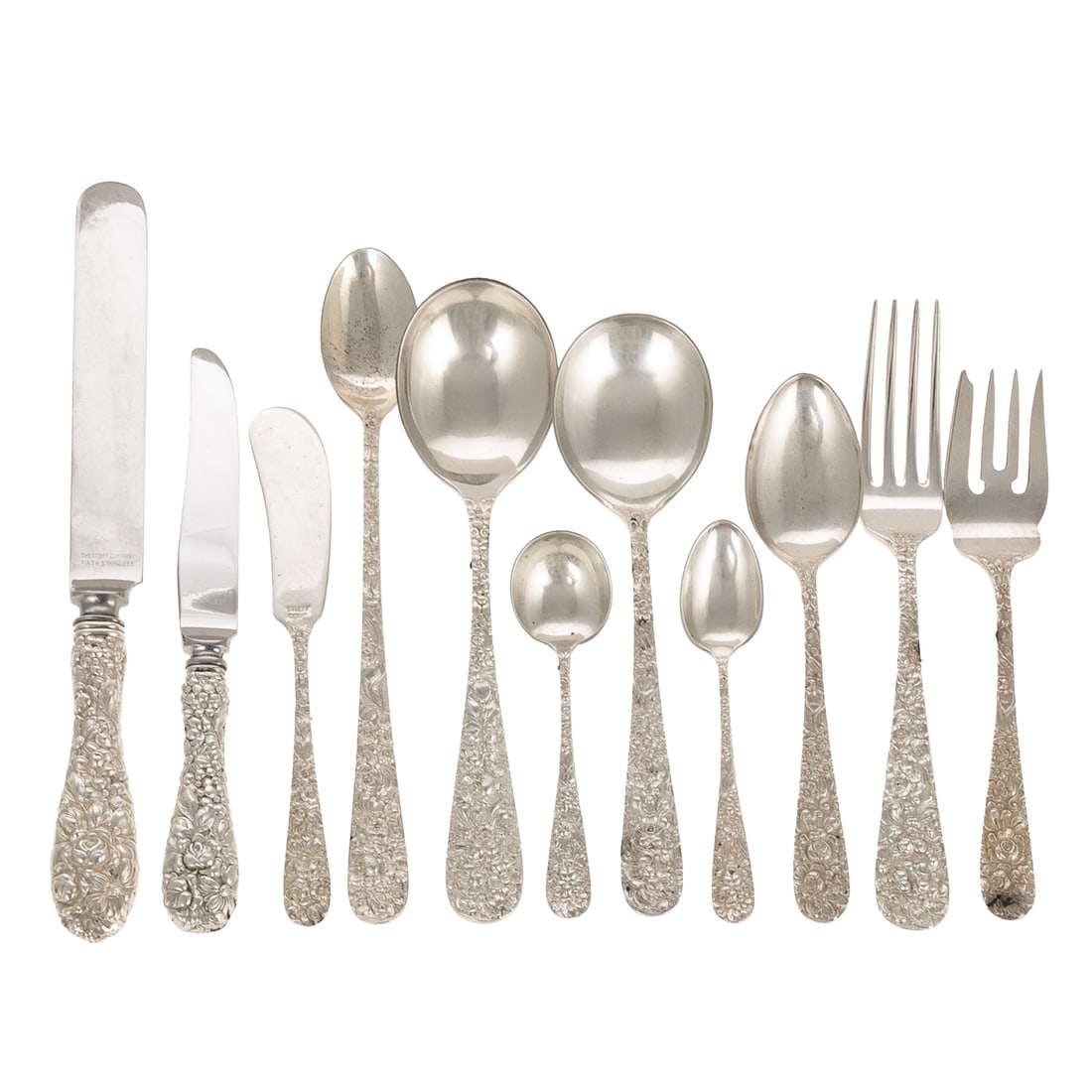 Large Group of Stieff Sterling "Rose" Flatware: Including: two Old French dinner knives, two dinner forks, eight salad forks, 21 teaspoons, nine flat butter spreaders, 11 iced tea spoons, nine cream soup spoons, nine gumbo spoons, dinner spoon, 11