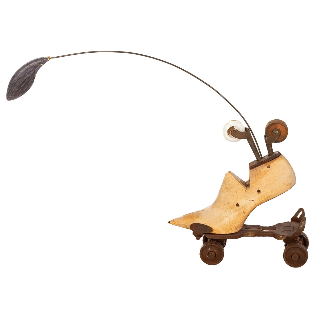Susan Bailey. "Shoes on Wheels," mixed media: (20th century) Mixed-media sculpture, wood, metal, and plastic, unsigned, gallery label affixed to underside, 16 in. H, 20 in. W, 3 in. D Provenance: From a private collection, Washington, DC