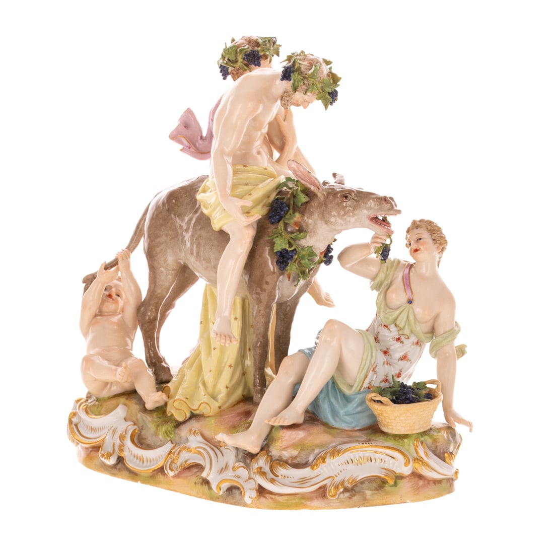 A Meissen Figural Group "The Drunken Silenus": 19th century, a Meissen porcelain figural group of "The Drunken Silenus," with gilt accents, marked on bottom with blue crossing swords, incised 2724, 8 1/4 in. H, 8 1/4 in. L, approx. 5 in. D