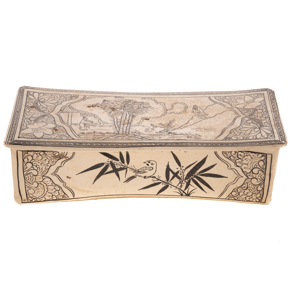 A Chinese Song Style Ceramic Pillow: A ceramic glazed Chinese Song style pillow depicting figures in landscape, flower motifs, and on the front of one side a bird on a branch. Includes sticker on bottom "The Wil Farrow Collection" and an