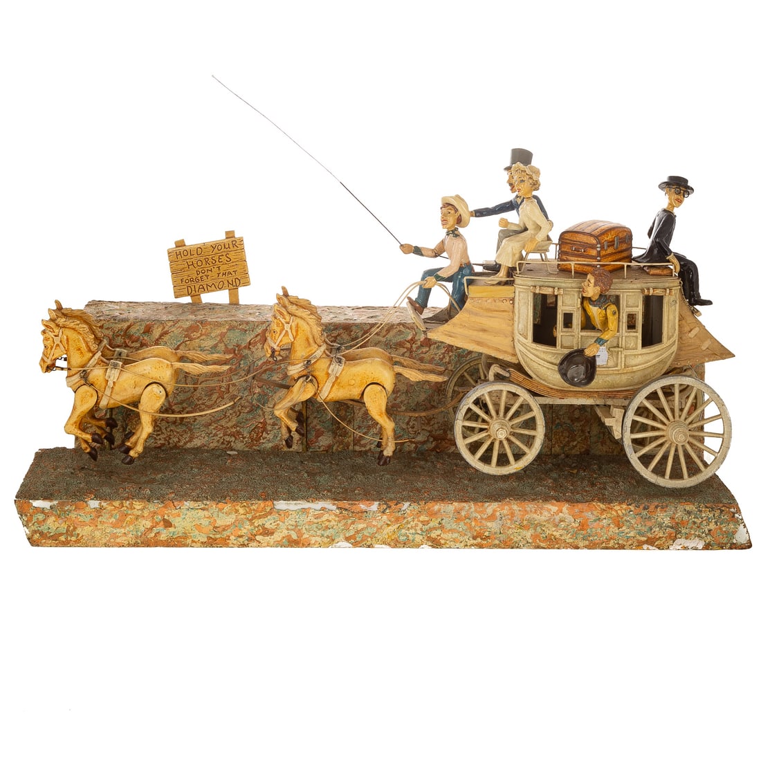 A Baranger Studios "Stagecoach Honeymoon" Display: (California, 1954) A Baranger Studios "Stagecoach Honeymoon" M-227 animated advertising motion display, advertising sign behind the group reads "HOLD YOUR HORSES DON'T FORGET THAT DIAMOND," marked on