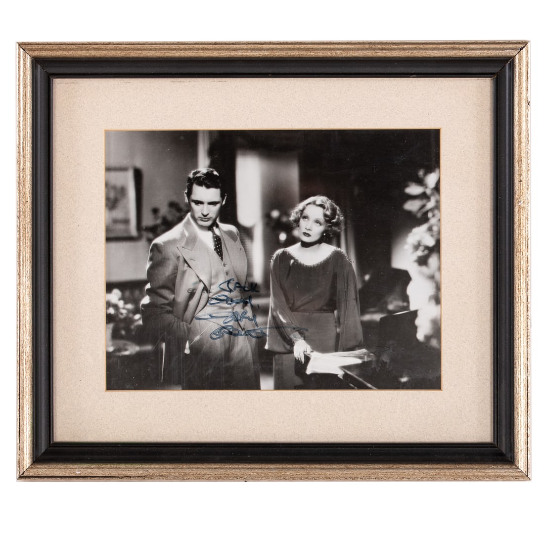 Cary Grant, Framed & Autographed Photo: Early 20th century, silver gelatin print featuring a movie still of the young Cary Grant, signed "Jack Good, Cary Grant," sight size: 7 x 9 in., framed size: 11 1/2 x 13 1/2 in.