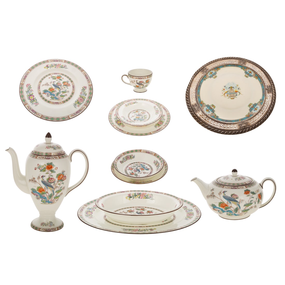 A Wedgwood China Kutani Crane Partial Service: Partial dinner service in chinoiserie pattern, comprising 73 pieces, including ten dinner plates, nine lunch plates, nine bread plates, six soup bowls, 12 dessert bowls, 11 teacups, 11 saucers, coffee