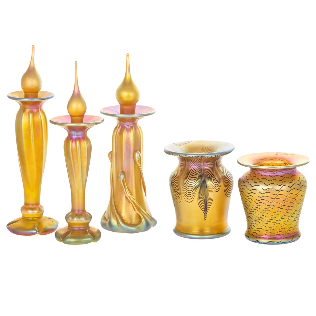Five Zephyr Glass Works Gold Iridescent Vessels: Consisting of two combed barrel-form vases and three floral-form covered perfume bottles, size of tallest: 9 1/2 in. H