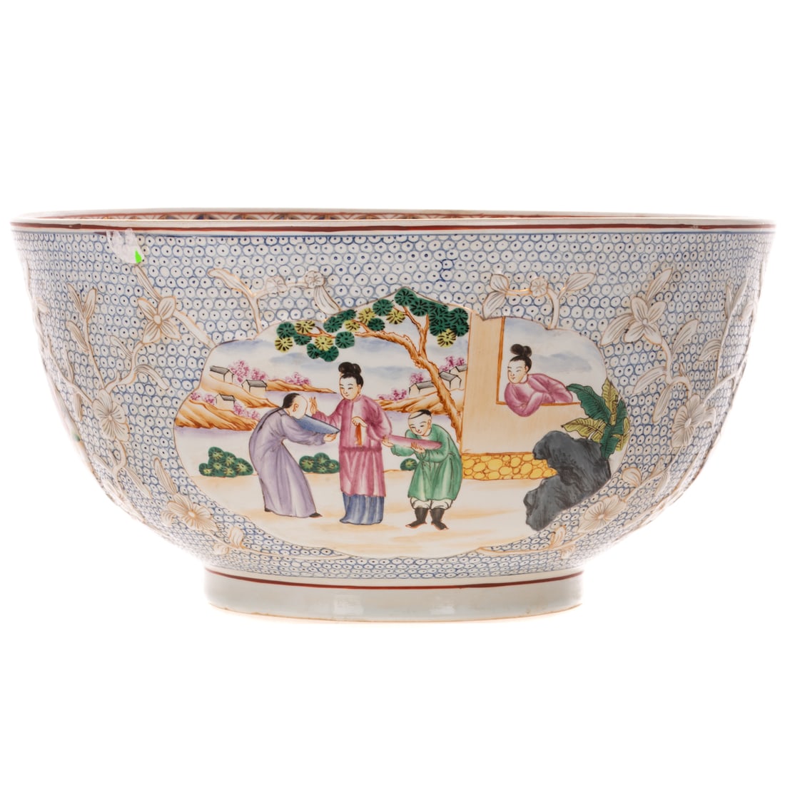 Chinese Flowering Prunus Relief Erotica Punchbowl: Qing after Qianlong period, raised polychrome painted figural vignettes on underglaze blue painted ground, erotic scene on underside painted within the foot rim, 14 in. Diam.