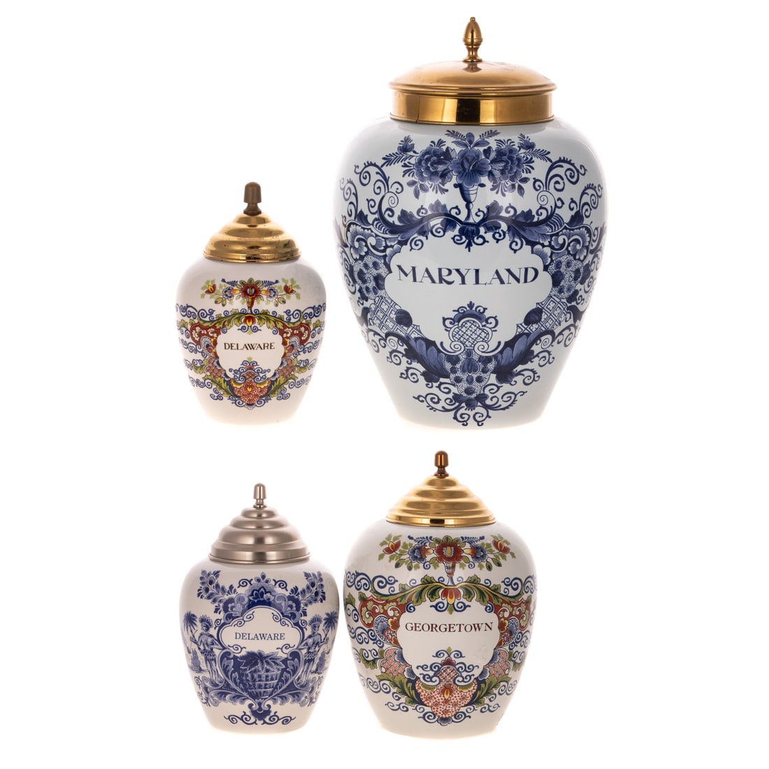 Delft "Georgetown," "Maryland" & "Delaware" Jars: Two Royal Goedewaagen Delft ceramic tobacco jars including blue and white 'Delaware,' signed and with silver tone cover, 9 3/4 in. H, polychrome 'Delaware', signed and with brass tone cover, 7 1/2