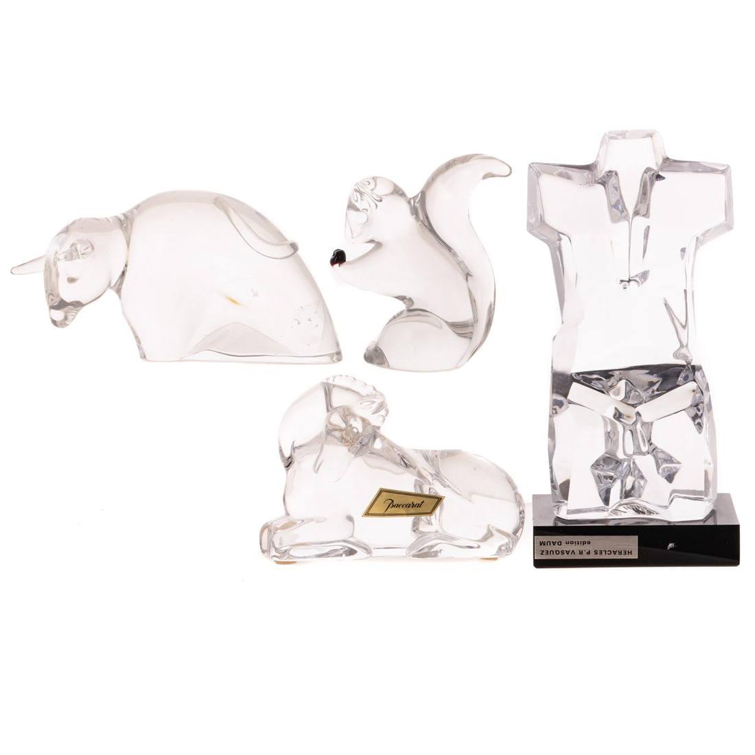 Four Colorless Art Glass Cabinet Figures: Consisting of a Steuben bull 8 in. L; a Pedro Ramirez Vazquez for Daum torso, 7 1/2 in.; an unmarked squirrel, 5 1/2 in.; and a Baccarat ram, 4 5/8 in. L