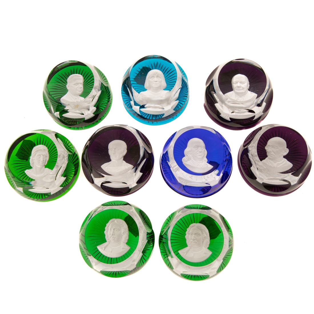 Collection of Nine Baccarat Sulphide Paperweights: Modern, for The Franklin Mint, busts of historical figures set on varying monochromatic beds, 2 7/8 in. Diam.