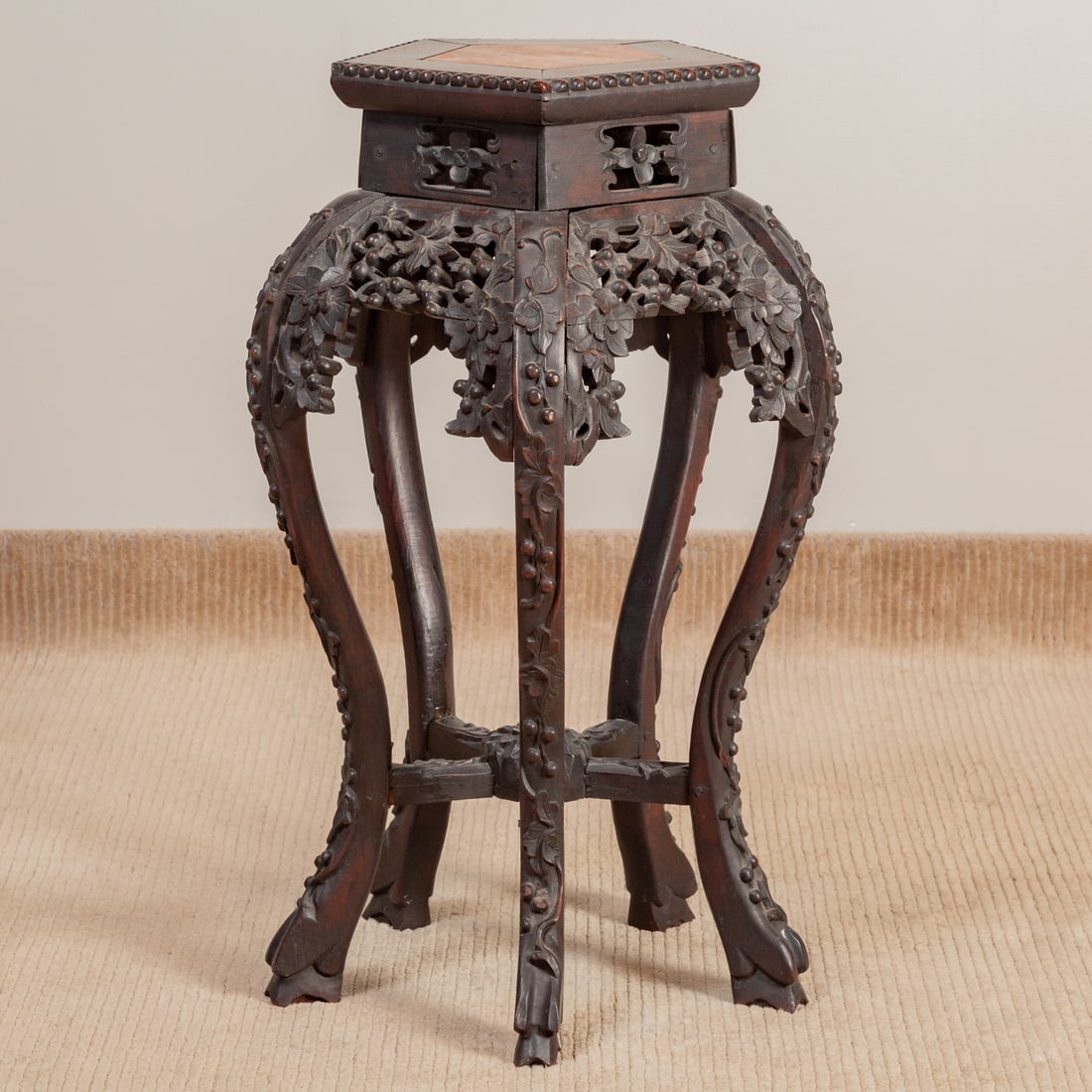 Chinese Carved Harwood Marble Top Tabouret: Pentagonal hardwood top with marble top inlay over a carved and reticulated apron extending into five curved legs connected by a center stretcher, 26 1/2 in. H, 13 in. Diam.