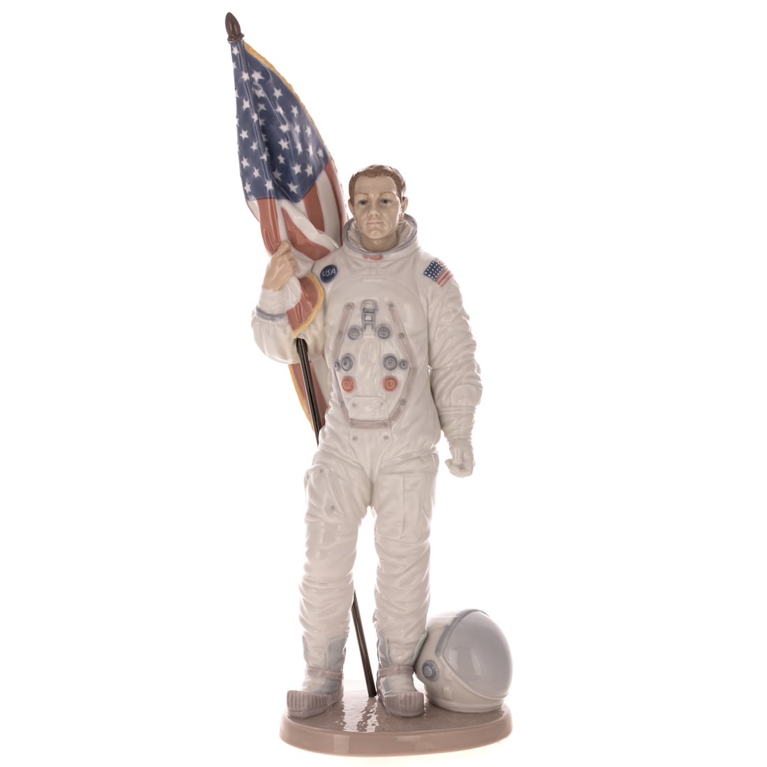 A Lladro "The Apollo Landing," Signed by Aldrin: C. 1994, limited edition, model #06168, commemorating the 25th anniversary of the 1969 moon landing, signed by Buzz Aldrin on base, and impressed A-24F, 16 3/8 in. H