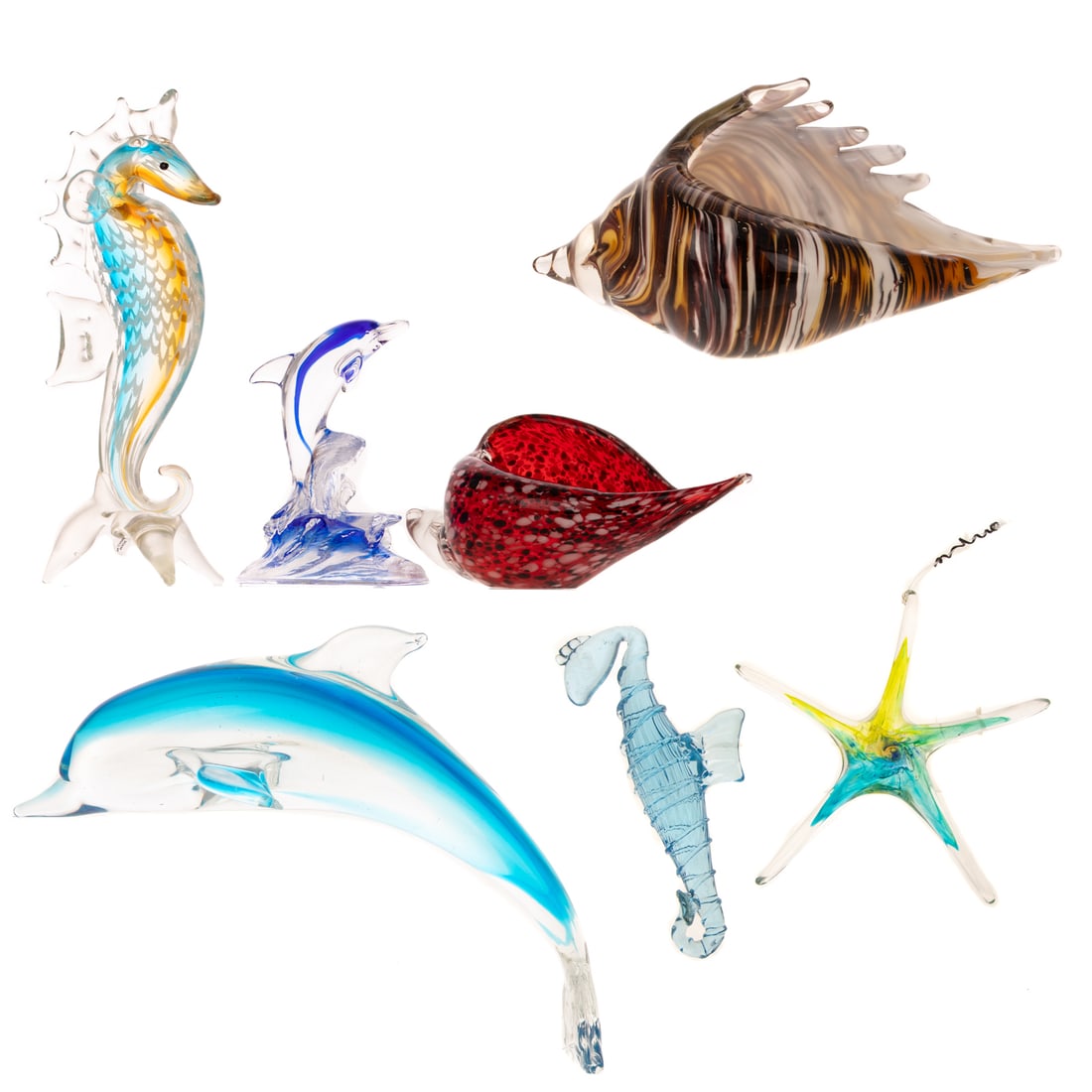 Collection of Sea Themed Art Glass: Seven pieces including: two shells, two dolphins, two seahorses, and a starfish, largest is 11 1/8 in. H