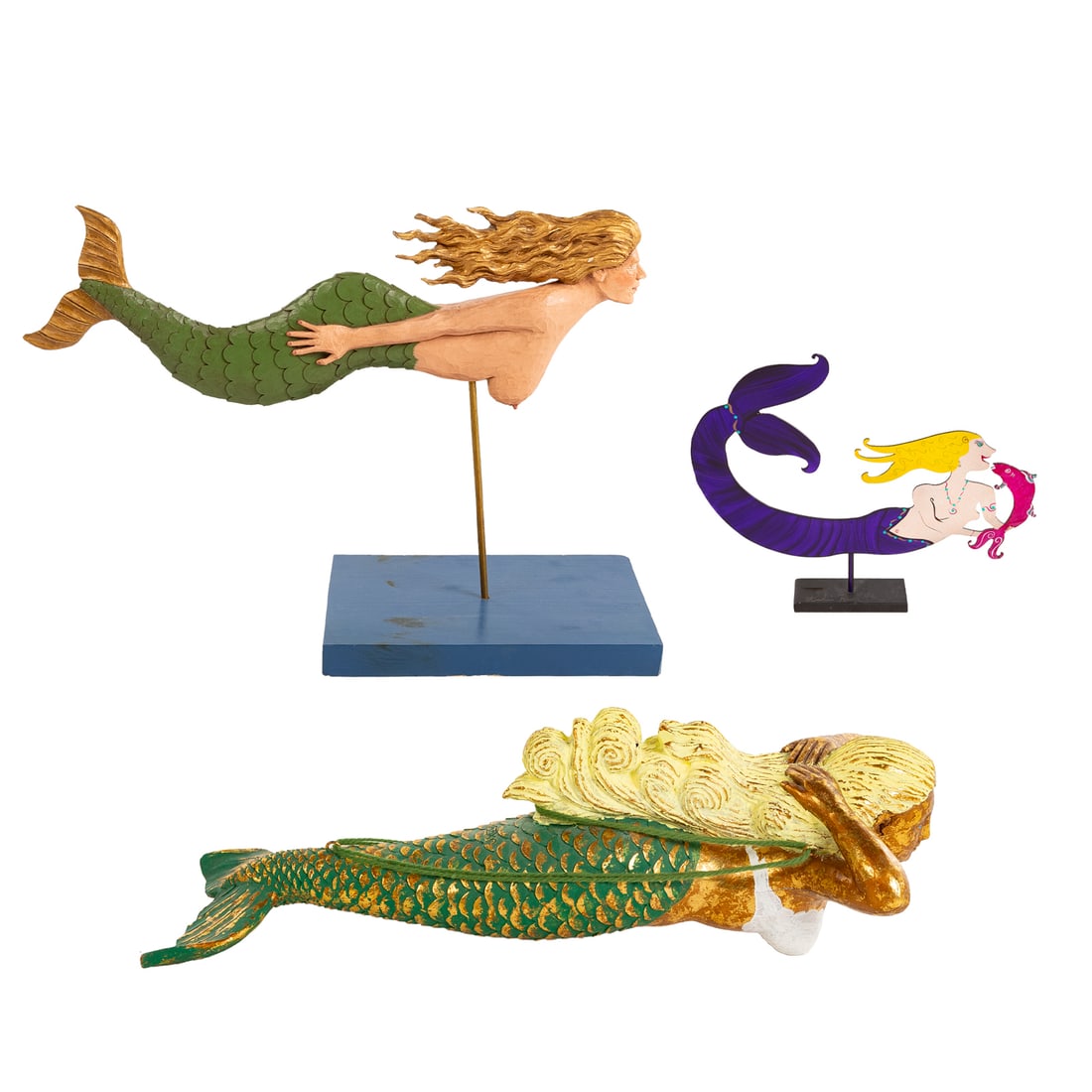 Three Mermaids: Including: a composite folk art mermaid by Christopher LaMontagne, 51/500, 1996, figure is 9 in. H, 27 in. W; a hand-painted metal mermaid by Claudine Buell, signed, 11 7/8 in. H, 14 1/8 in. W; and a